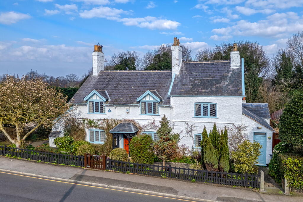 Main image of property: The White Cottage, 156 Oldfield Road, Altrincham, Greater Manchester WA14 4BJ