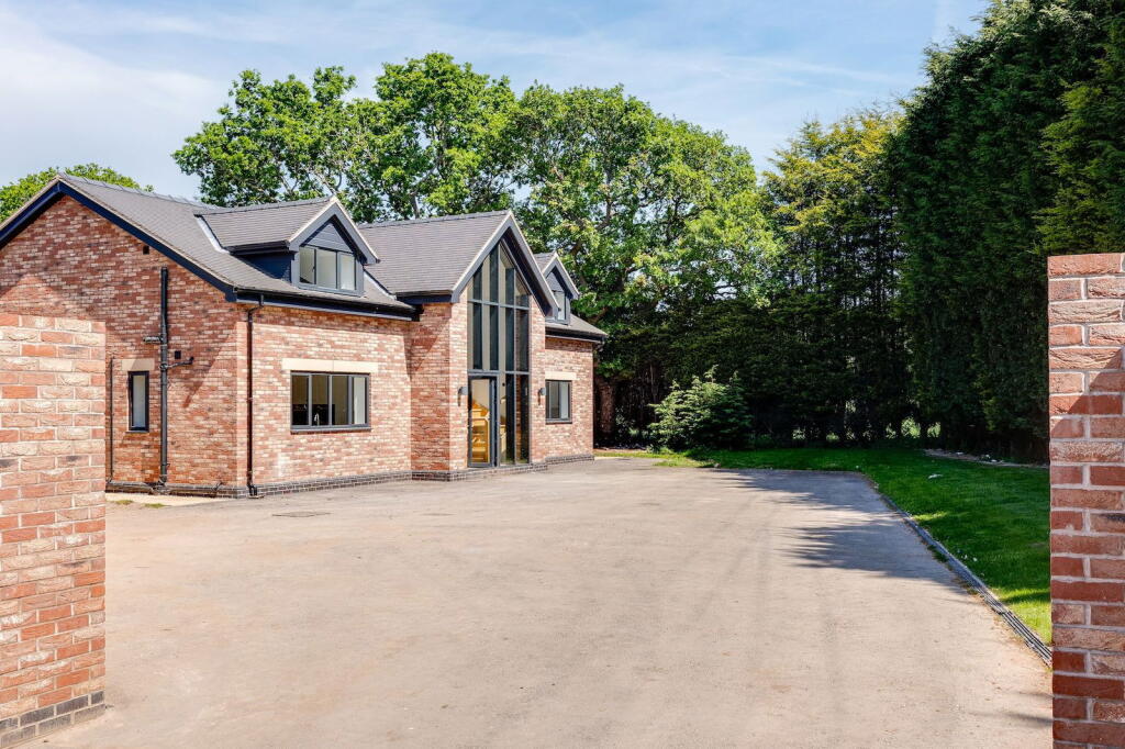 Main image of property: Contemporary detached home in High Legh with large garden