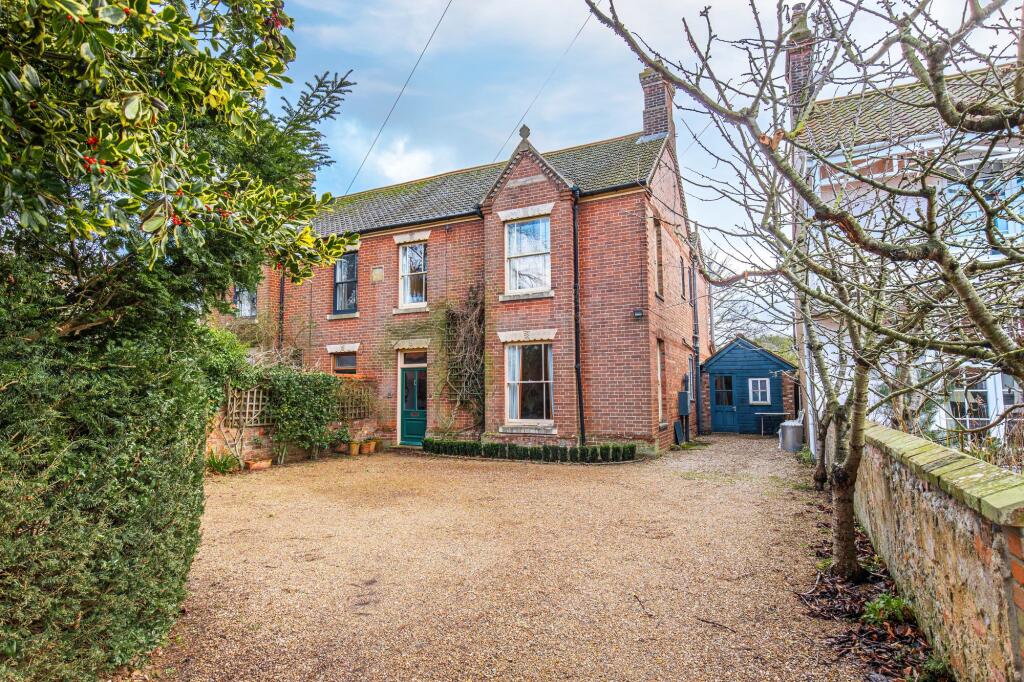 Main image of property: Elegant Red-Brick Edwardian Home in Holt