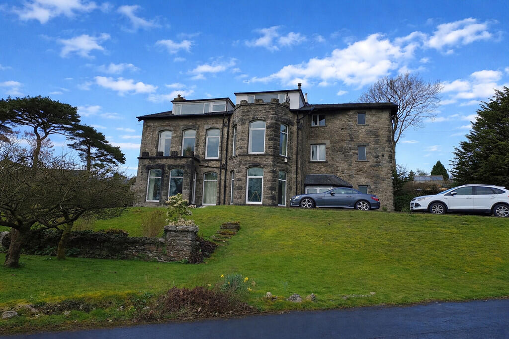 Main image of property: Top Flat, Seawood House, Carter Road, Grange-over-Sands, Cumbria, LA11 7AS