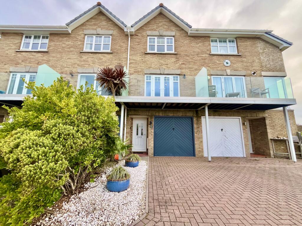 Main image of property: Modern 3-Bedroom Townhouse in Wyke Regis