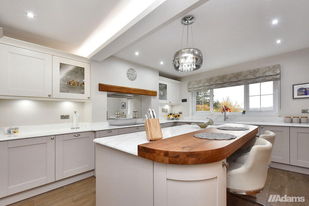 Main image of property: Delph Lane, Daresbury. Stunning Family Home In A Large Private Plot