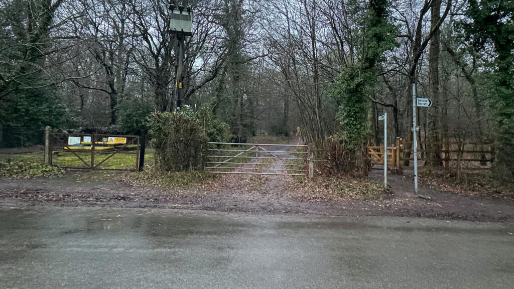 Gated entrance off Hogpits Bottom.