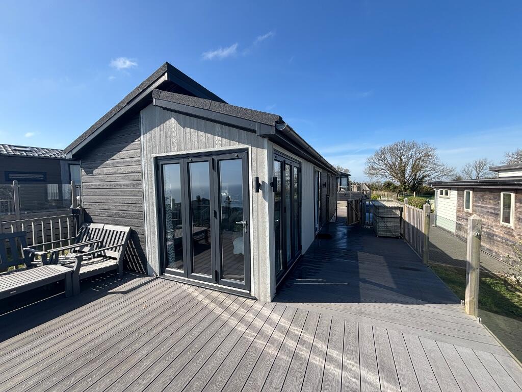 Main image of property: 2 Sandy Lane, Torquay Road, TQ14 0BG