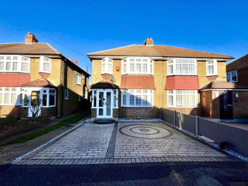 Main image of property: Rhodrons Avenue, Chessington, Surrey. KT9 1AY