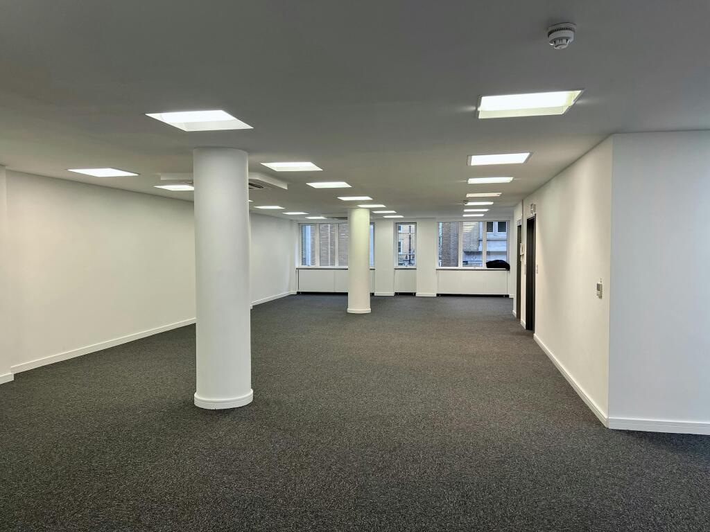 30-31 Furnival 1st Floor Spacious Office Area With Pillars And Large Windows.jpg