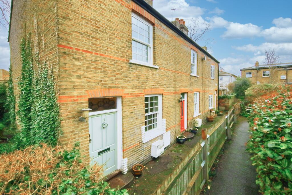 Main image of property: Hesley Cottages, High Street, KT1