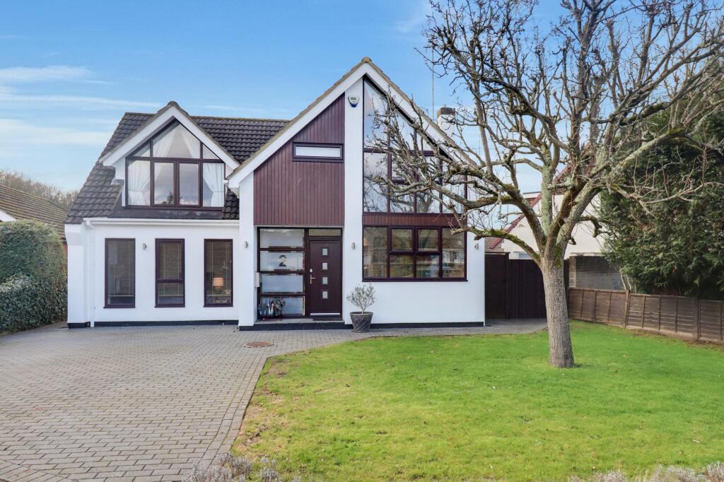 Main image of property: 2 Forge Drive Claygate KT10