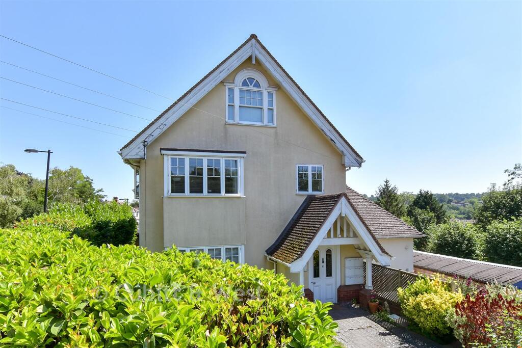 Main image of property: Woodcote Grove Road, Coulsdon, Surrey