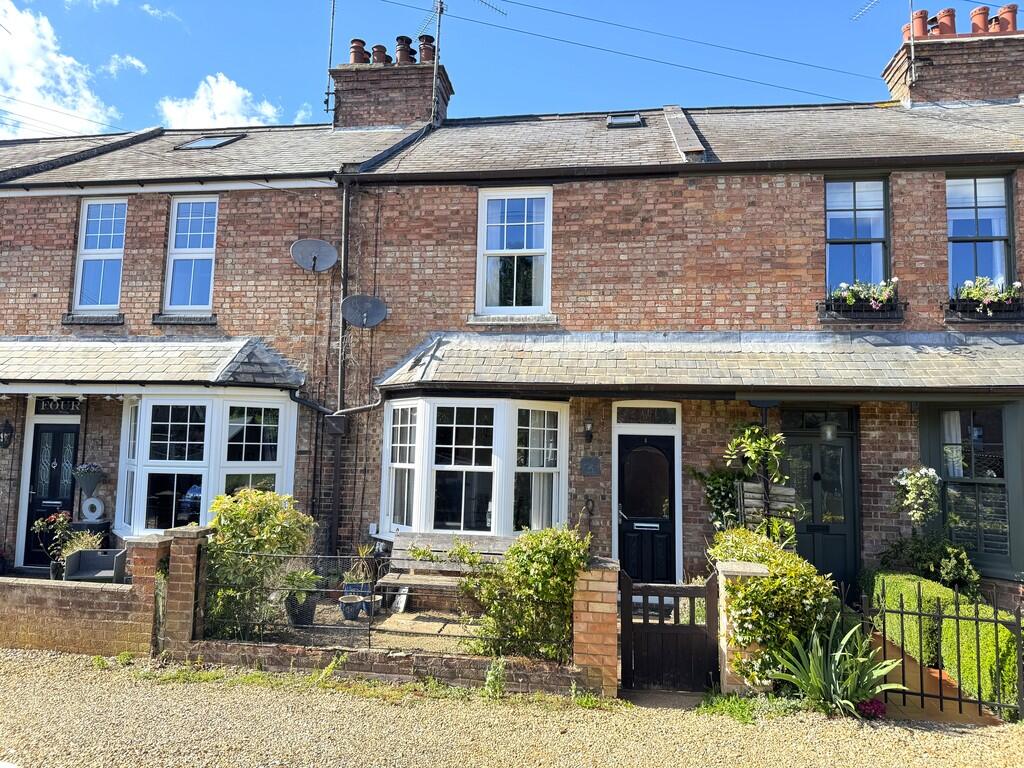Main image of property: KING'S LYNN - Mid-Terrace House on private road in popular "Chase" Area