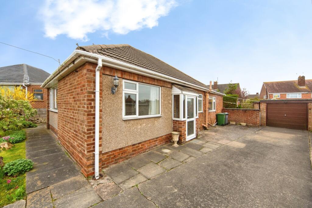 Main image of property: Wrenbury Close, Prenton, CH43