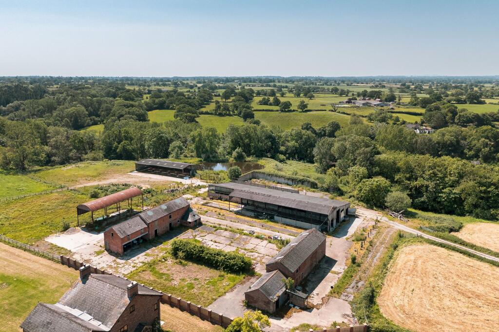 Main image of property: Broughton Hall, Threapwood, SY14