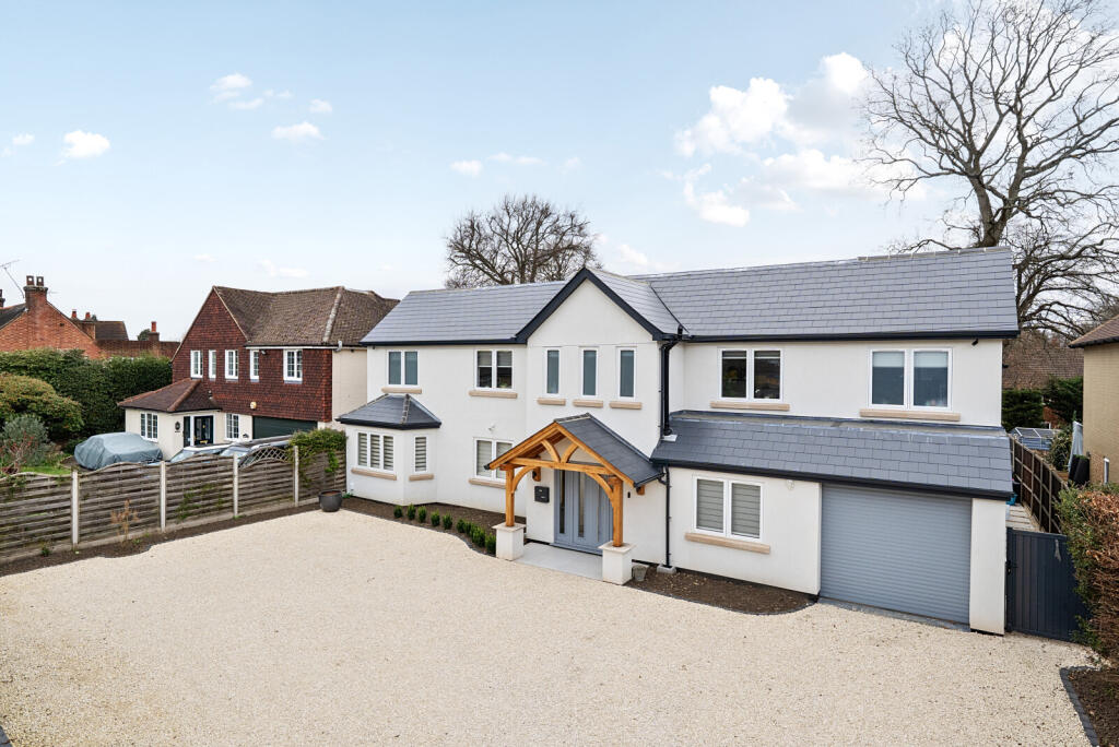 Main image of property: Pine Grove, Weybridge, KT13