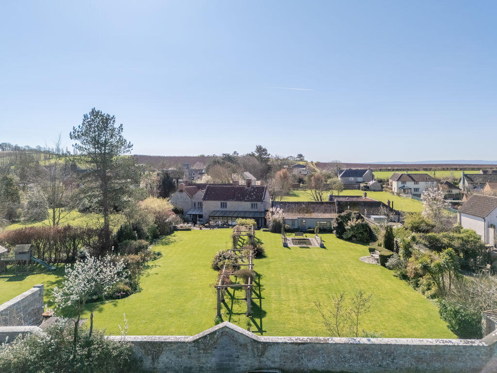 Main image of property: Elegant Grade II Home with Charming Cottages in Stawell, Somerset