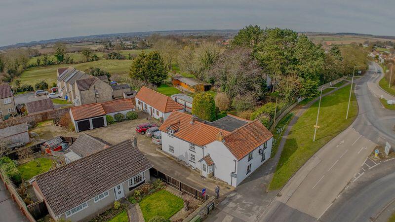 Main image of property: House + Land + Stables + Holiday Lets - Main Street, Seamer