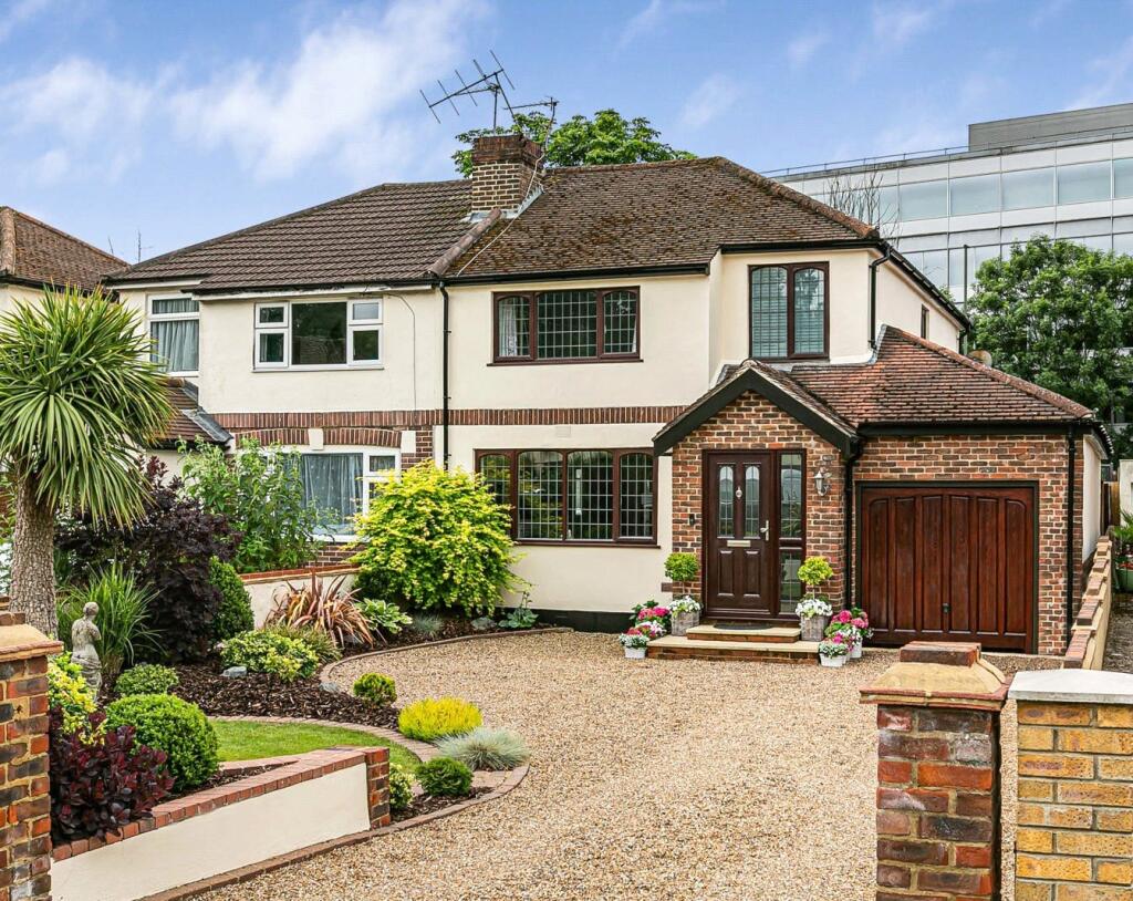 Main image of property: Woodhaw, Egham, Surrey, TW20