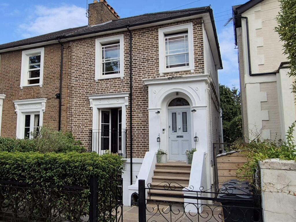 Main image of property: Woodlands Grove, Isleworth