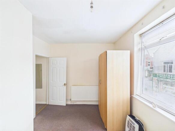 7 - Vacant shop, one-bedroom flat &amp; rear workshop.