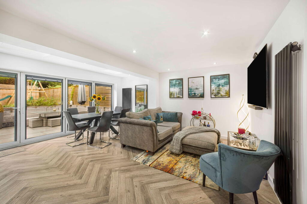 Main image of property: Mainwaring Drive, Wilmslow, SK9 2QD