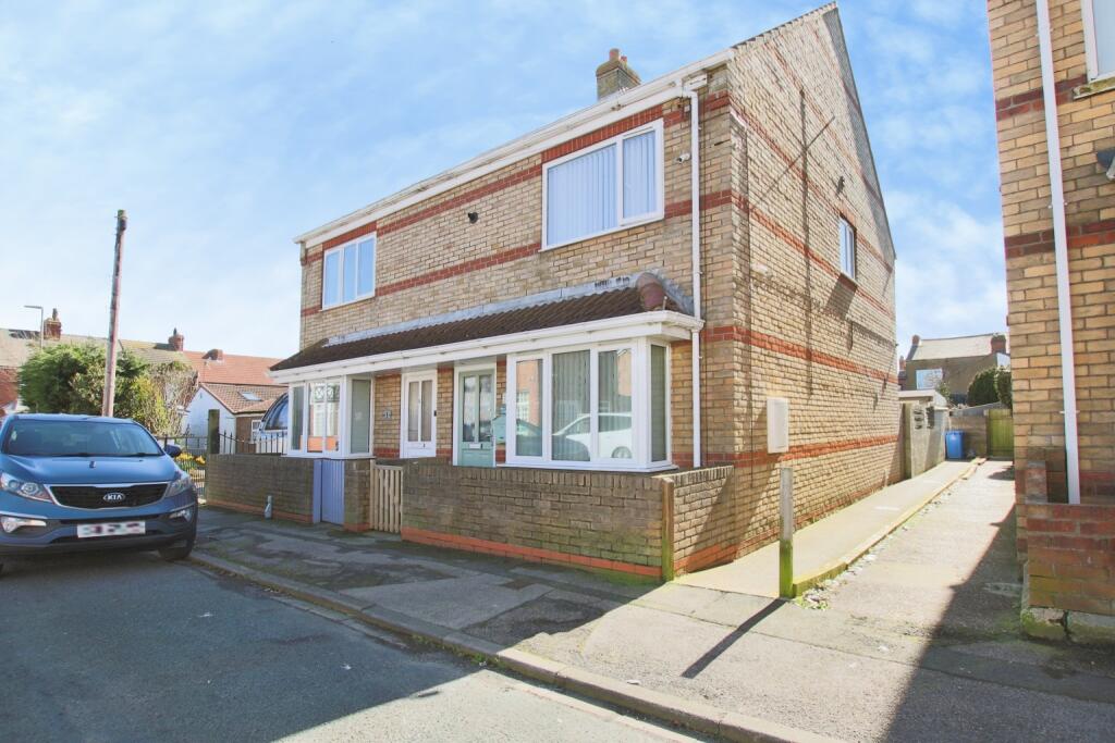 Main image of property: Seaglass Cottage, Hubert Street, Withernsea, HU19 2AT