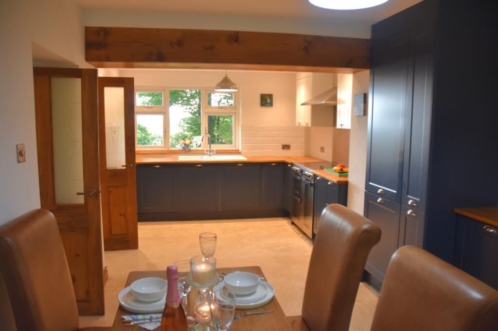 House in Swansea - More