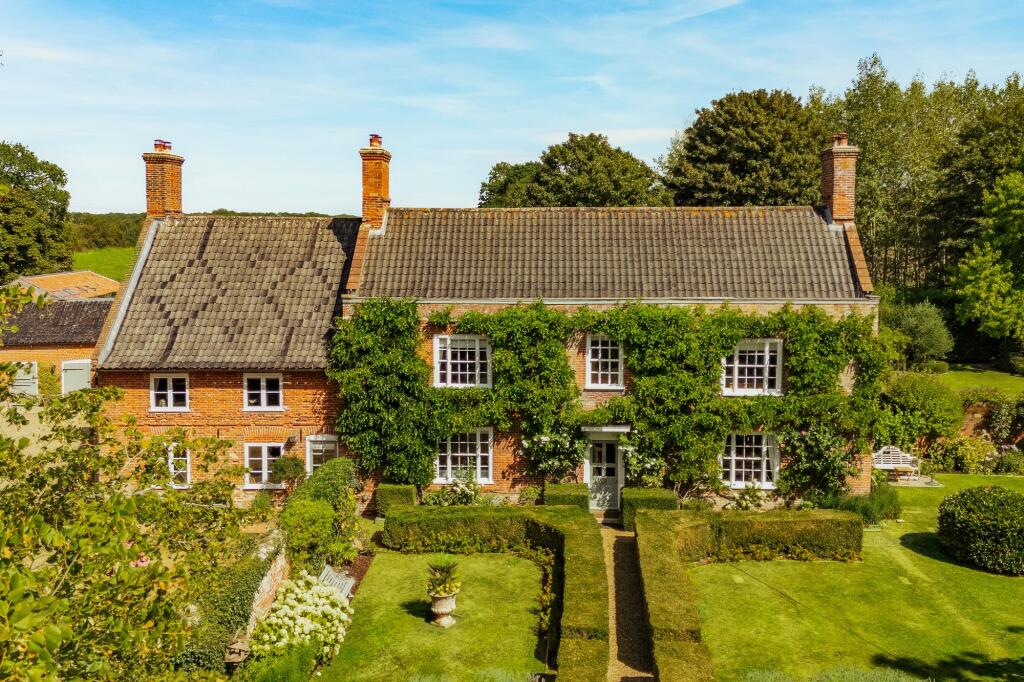 Main image of property: A Secluded Georgian Farmhouse in the Heart of Saham Toney