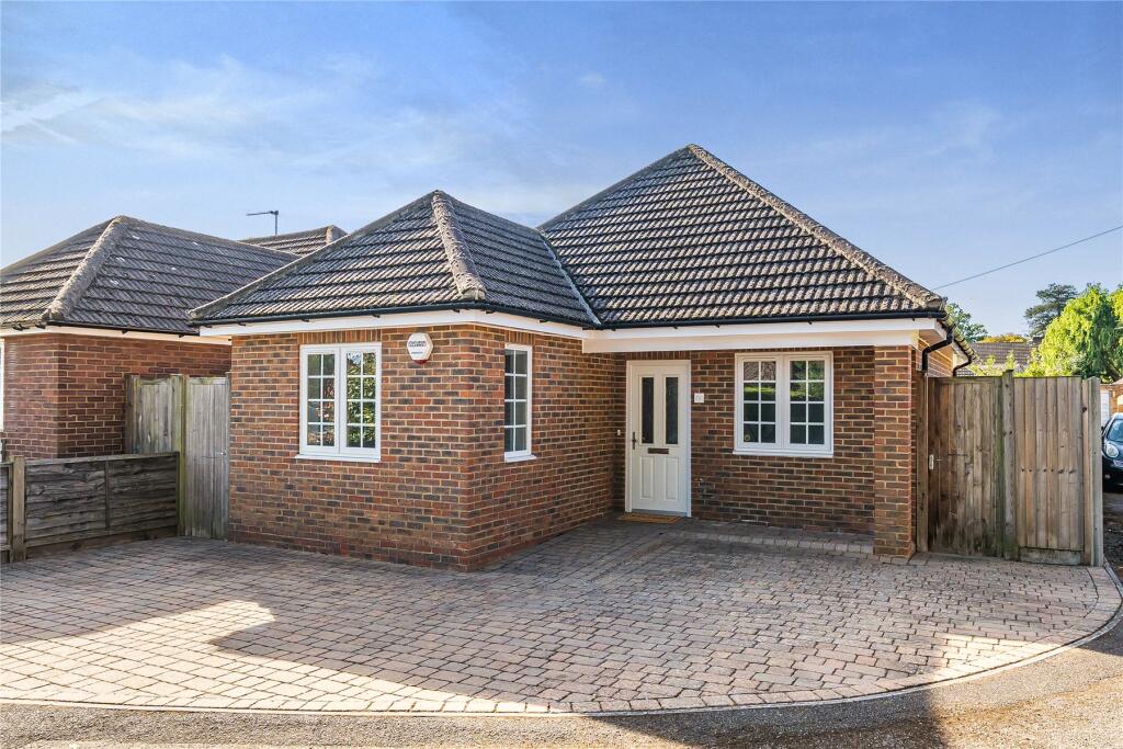 Main image of property: Burlea Close, Hersham, Surrey, KT12