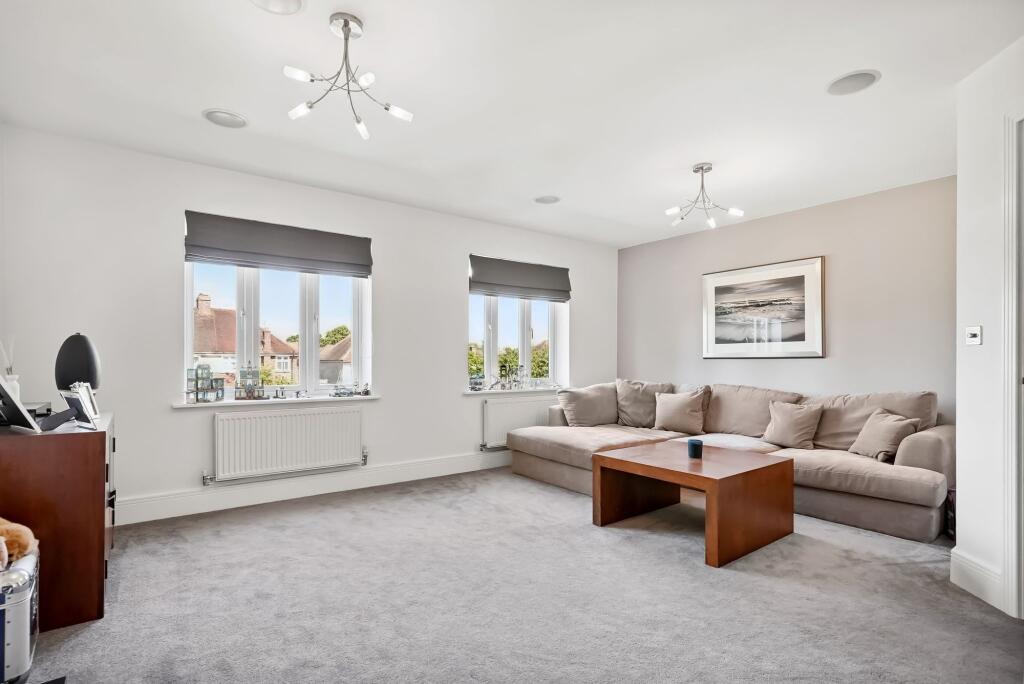 Main image of property: Poplar Close, Epsom, KT17