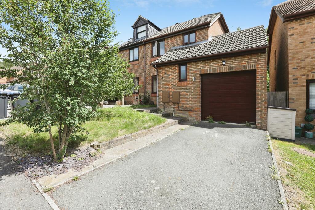Main image of property: Woodbury Avenue, East Grinstead