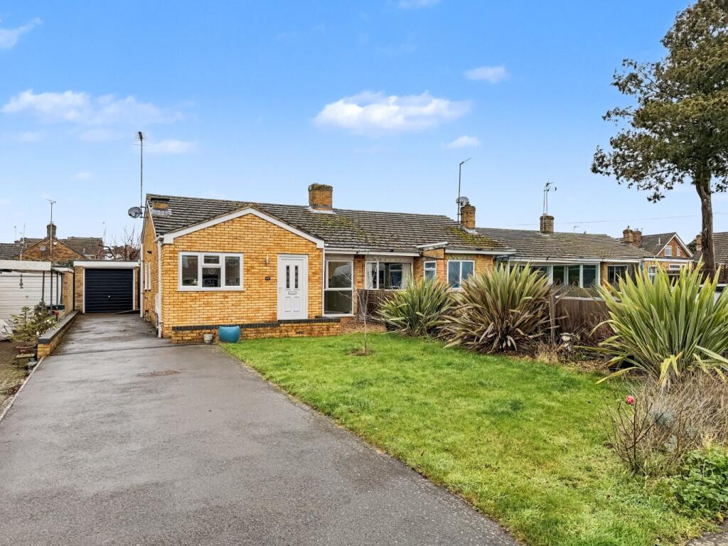 Main image of property: 45 Manor Close, Harpole, NN7 4BX