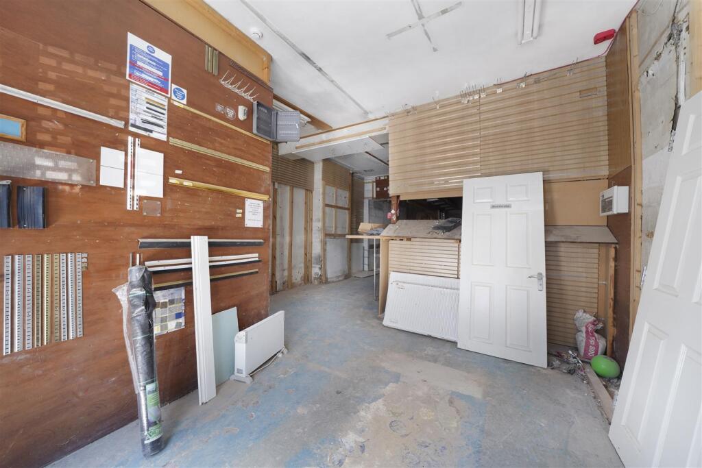 Front of house with shop front