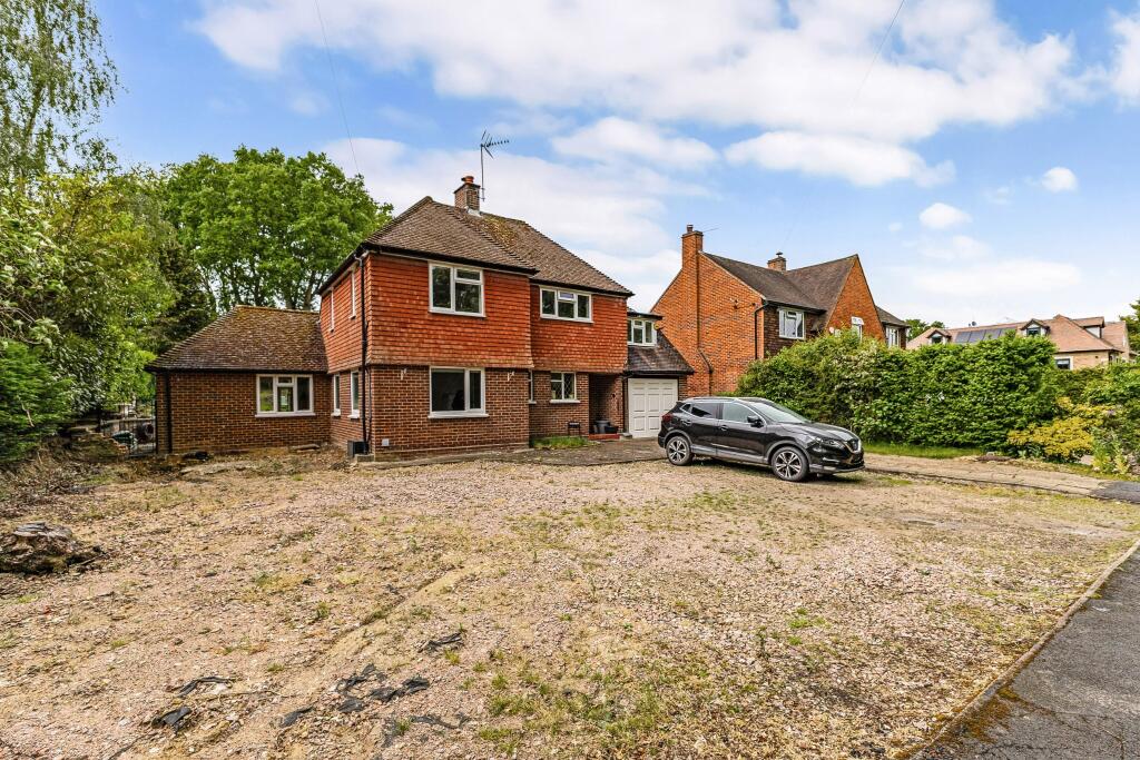 Main image of property: Knowle Grove, Virginia Water