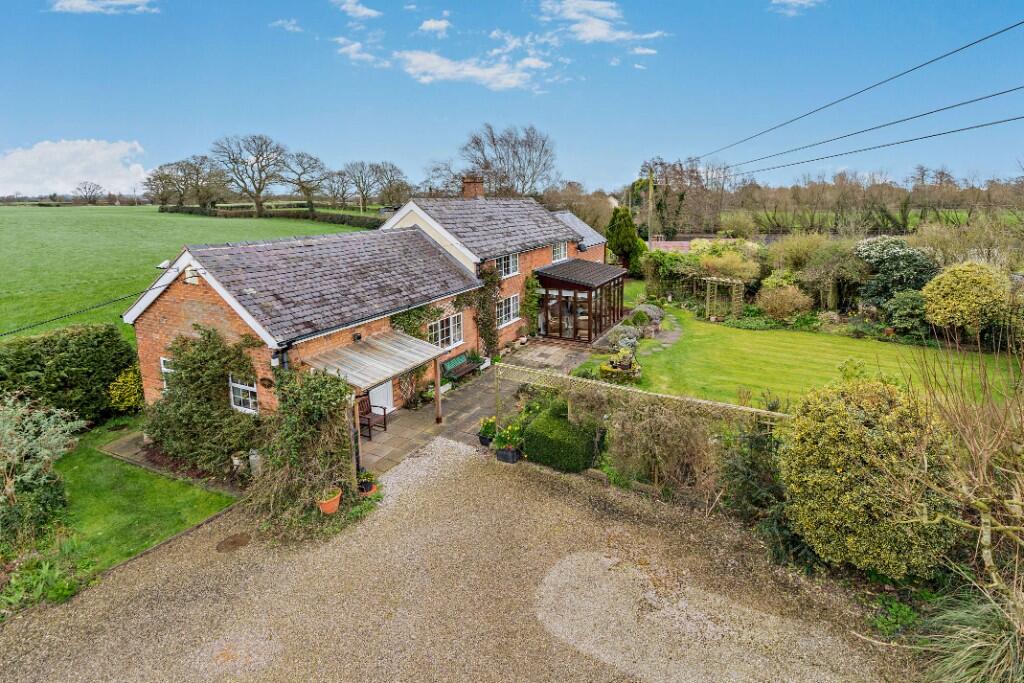 Main image of property: Woodvine Cottage