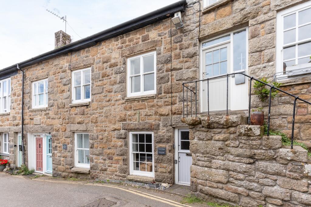 Main image of property: Commerical Road - Mousehole - Stunning 3 bedroom terraced home in Mousehole