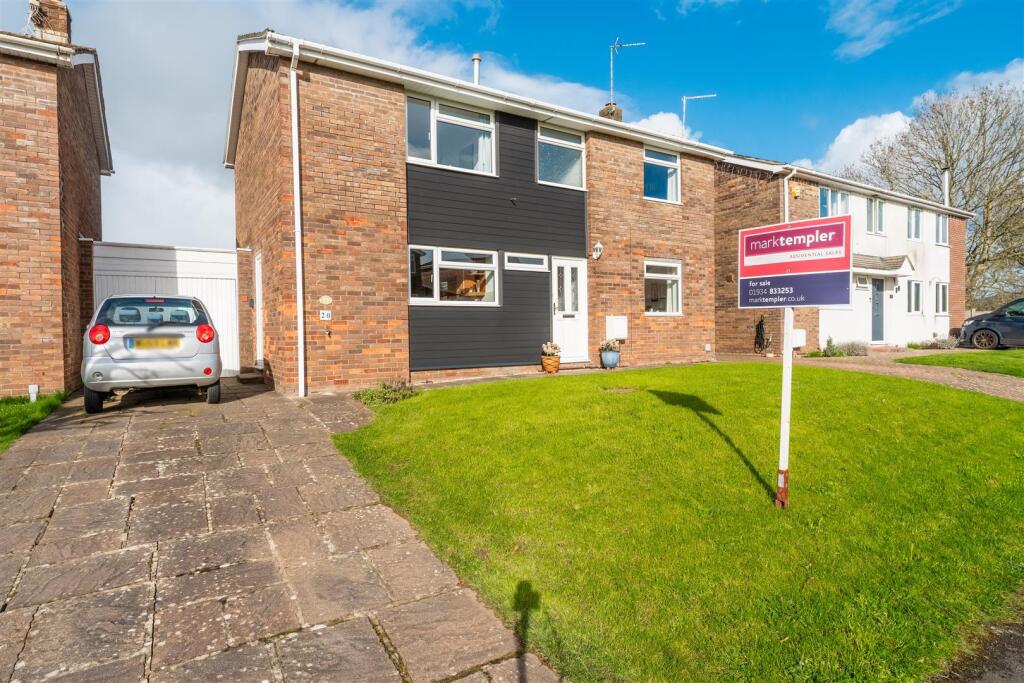 Main image of property: A charming four bedroom family home backing onto open playing fields in Yatton