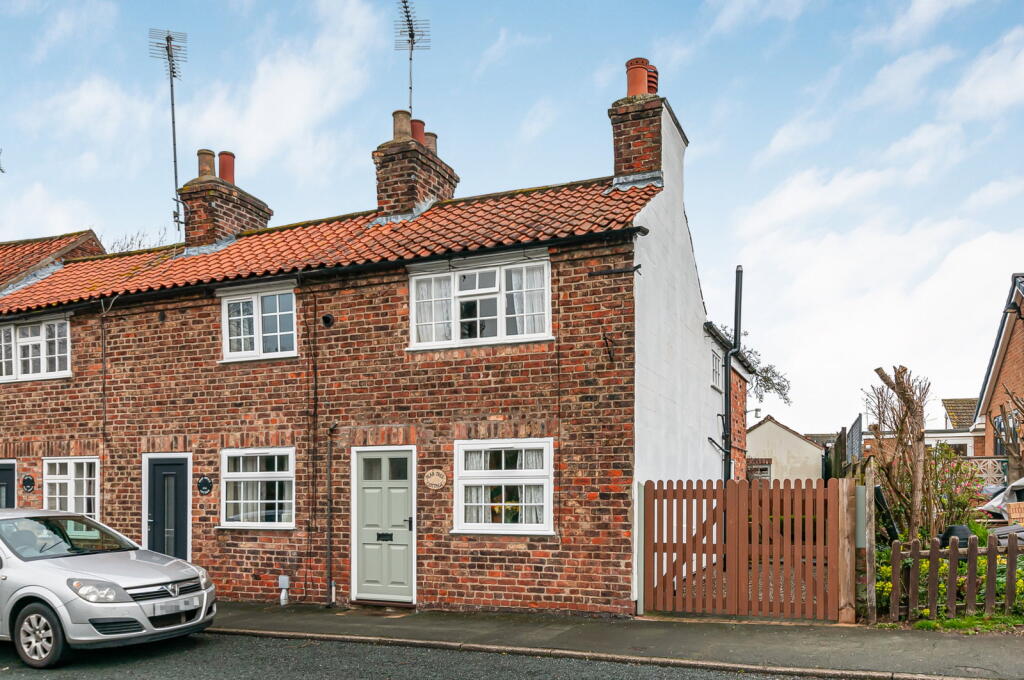 Main image of property: Pear Tree Cottage Main Street Cherry Burton Beverley HU17 7RF