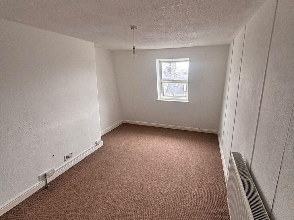Main image of property: Top Floor Flat 10 Holyrood Place