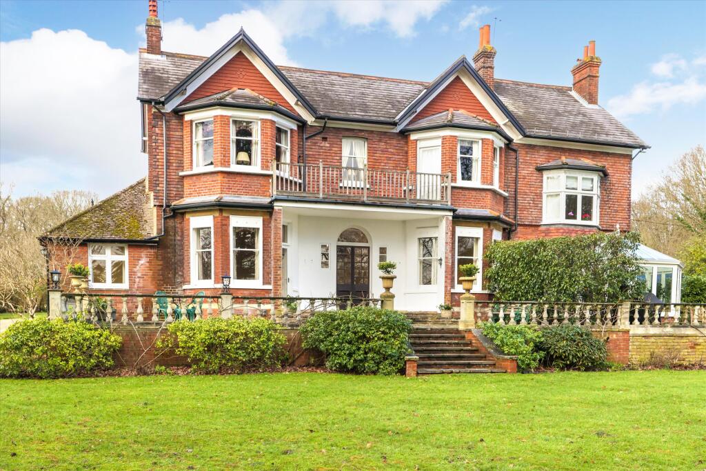 Main image of property: Caenwood House, Ashtead Woods Road, Ashtead, Surrey, KT21