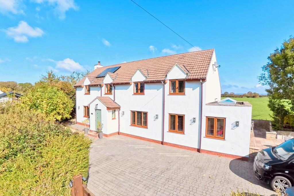 Main image of property: Substantial modern home within the idyllic village of West Hewish