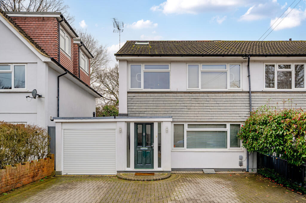 Main image of property: Woodend, ESHER, KT10