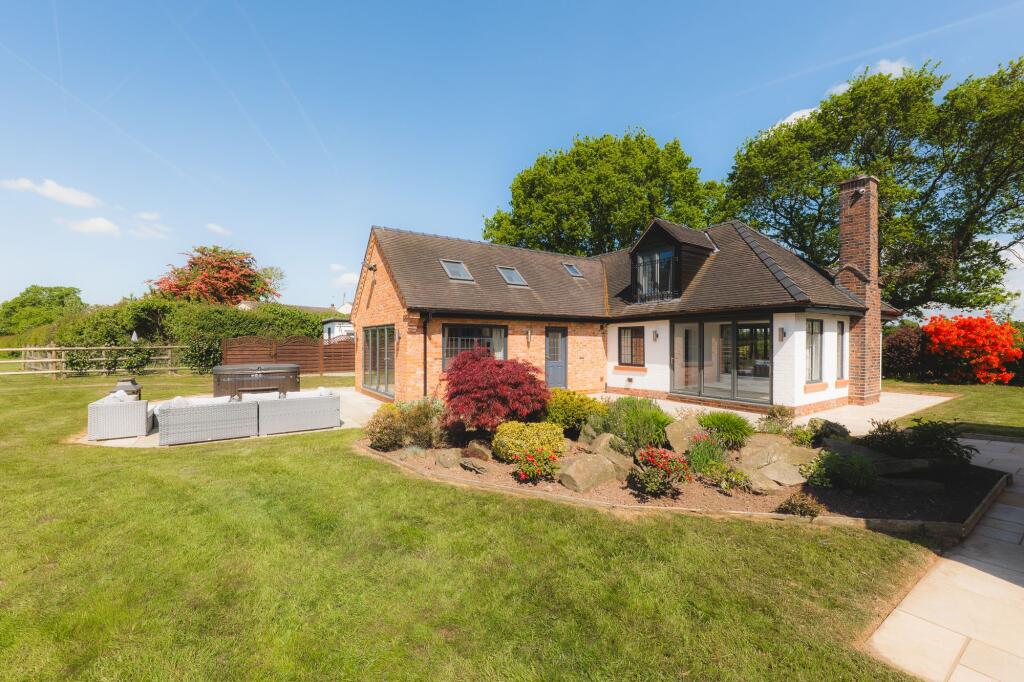 Main image of property: Deanley, Normans Lane, Higher Whitley, WA4 4PY