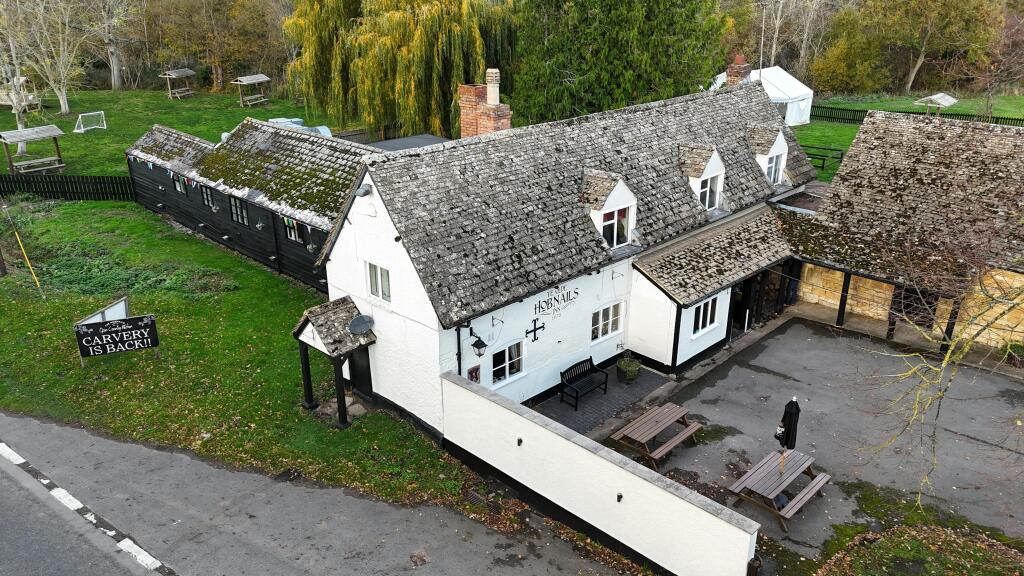 Main image of property: Hobnails Inn, Little Washbourne, Tewkesbury, GL20 8NQ