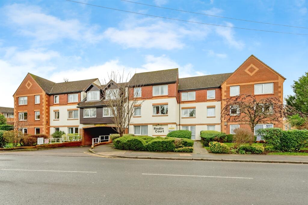 Main image of property: Redlin Court Redhill