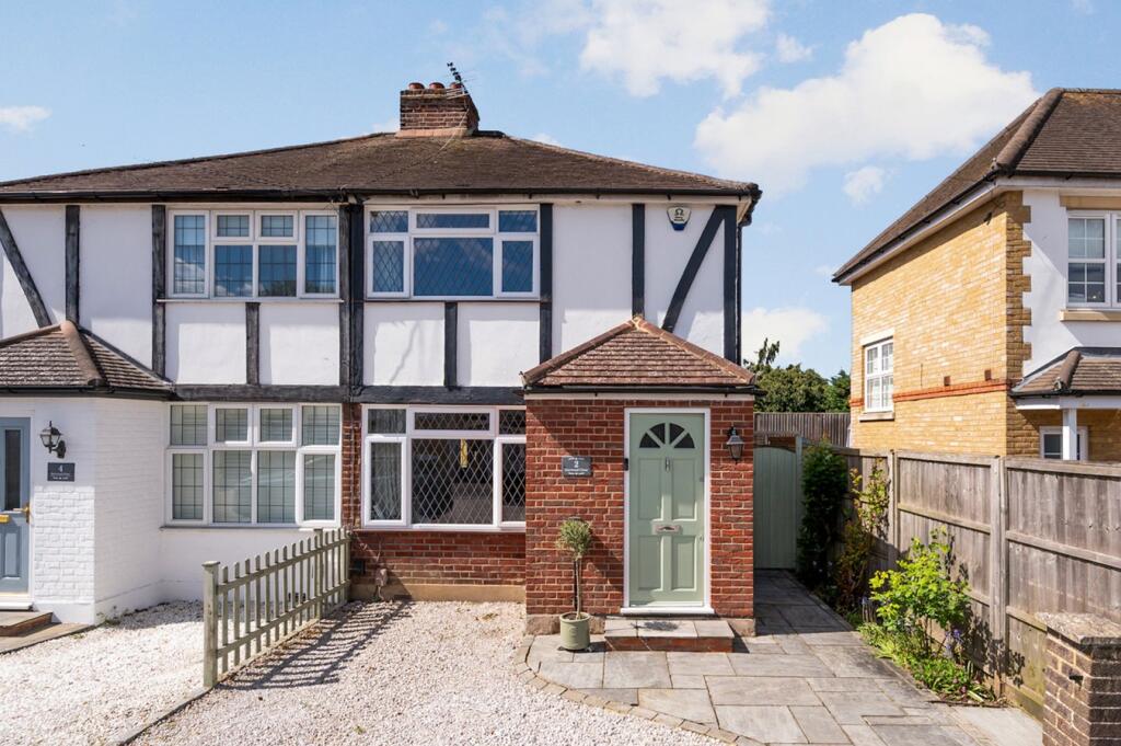 Main image of property: Burwood Close, Hersham Village, KT12
