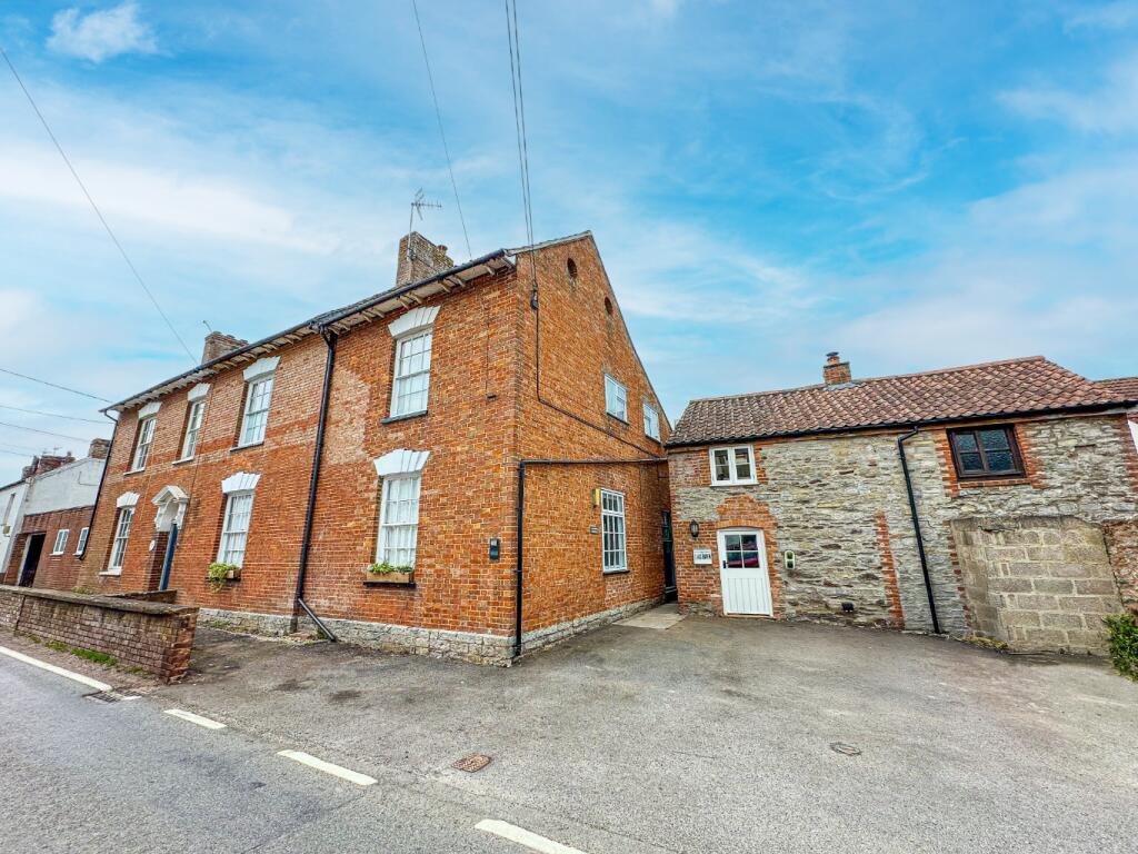 Main image of property: Charming Grade II Listed Georgian Home With One-Bedroom Annexe In The Popular Village Of East Lyng