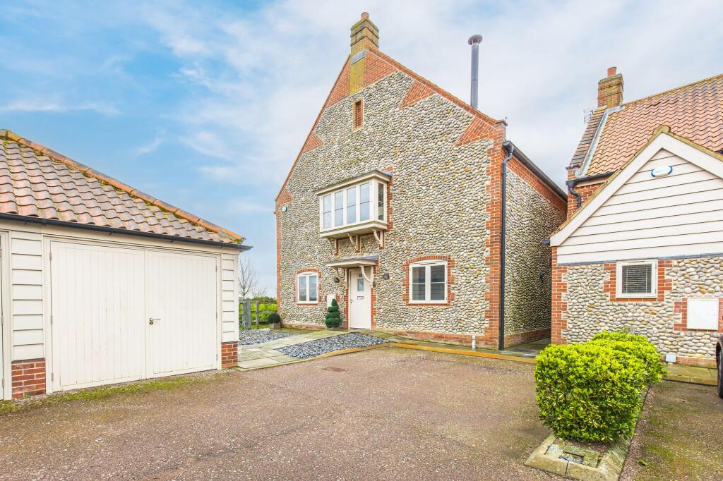 Main image of property: Striking Langham Flint Home in Exclusive Meadow Side Position