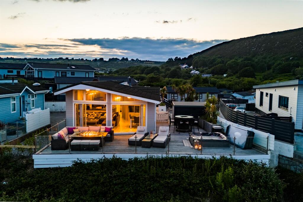 Main image of property: Beachfront chalet on The Warren