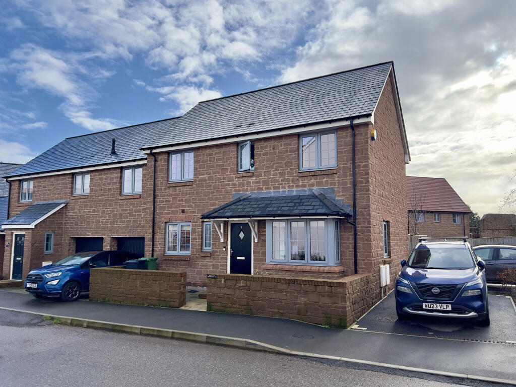 Main image of property: Three bedroom family home with garden and parking on edge of Quantock Hills!