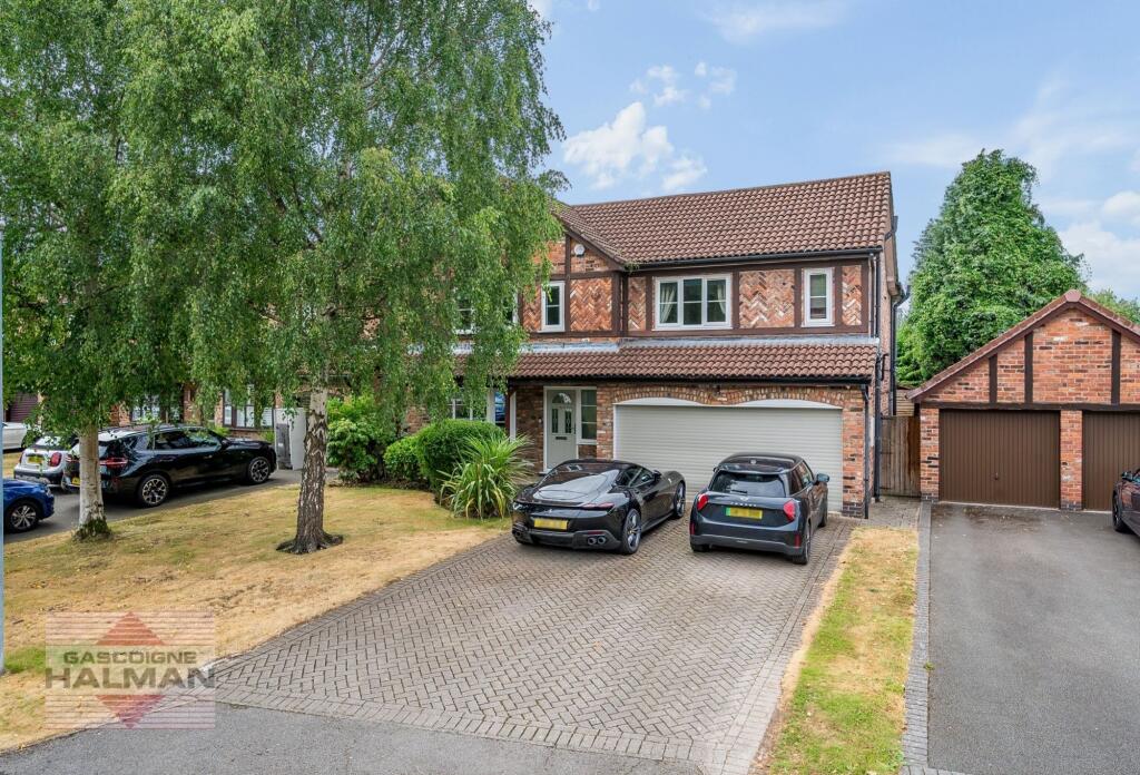 Main image of property: Thistlewood Drive, Wilmslow, SK9