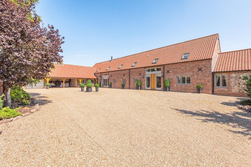 Main image of property: Exceptional Five Bedroom Barn Conversion in Gayton Thorpe
